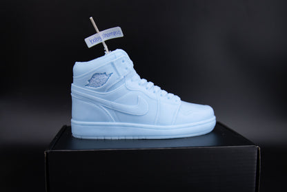 Side view of a light blue high-top basketball shoe-shaped candle