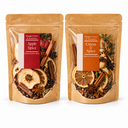 Styled illustration of two Maggie's Farm and Aromatics simmer-blend pouches, Apple Spice and Citrus & Spice