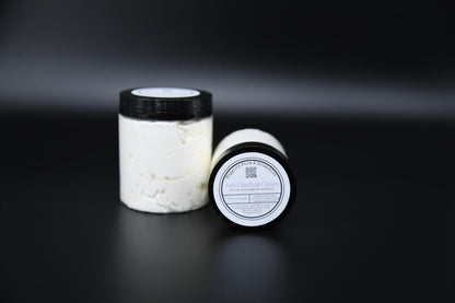 Two jars of anti-chafing cream with one labeled lid facing forward