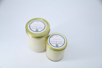 Large and small Birthday Cake soy candles viewed from above