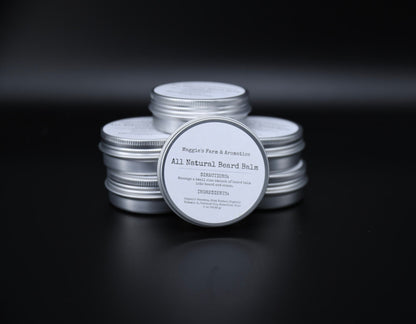 Several silver beard balm tins with one labeled tin facing forward