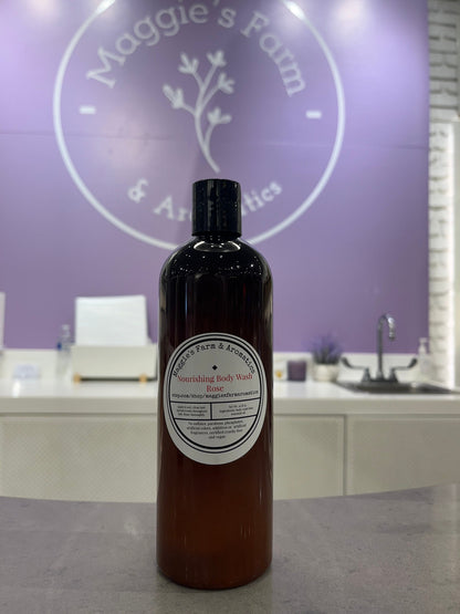 Single Rose body wash bottle displayed inside the shop