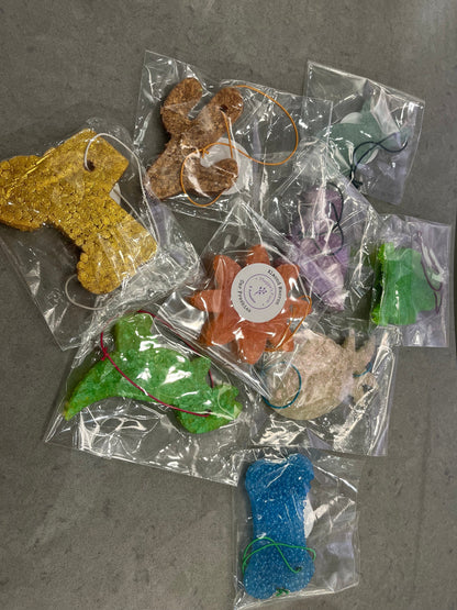 Assorted colorful packaged car freshies viewed from above