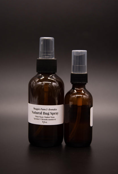 Two sizes of amber outdoor body spray
