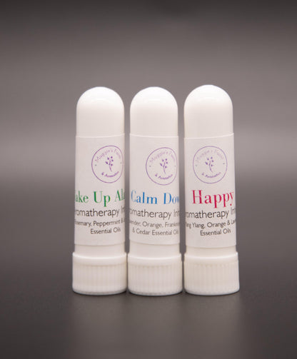 Three white pocket aromatic inhalers