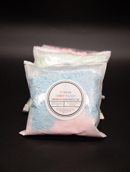 Strawberry and Blueberry fizzy bath sand bag with two bags behind it