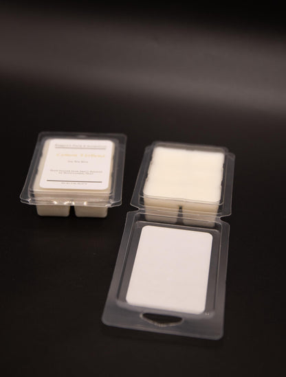 Open and closed Lemon Verbena soy wax melt packages arranged on a dark background