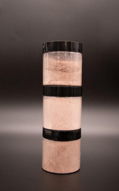 Three Rose Clay face mask jars stacked vertically