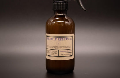 Close view of an amber Lavender wrinkle releaser bottle