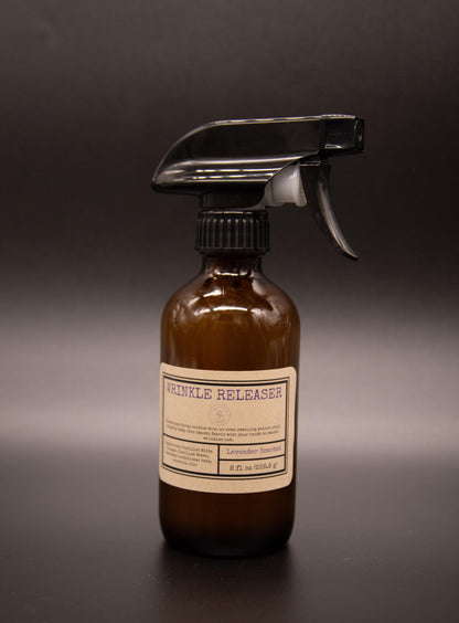 Amber wrinkle releaser bottle with black trigger sprayer