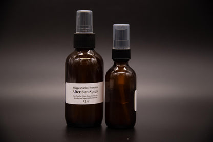 Large and small brown glass after-sun body mist bottles shown together