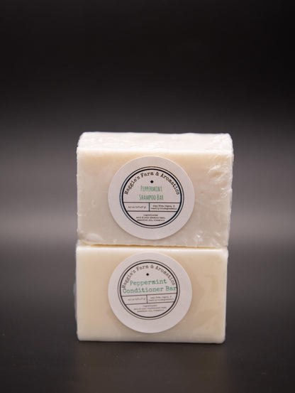 Peppermint shampoo and conditioner bars stacked together
